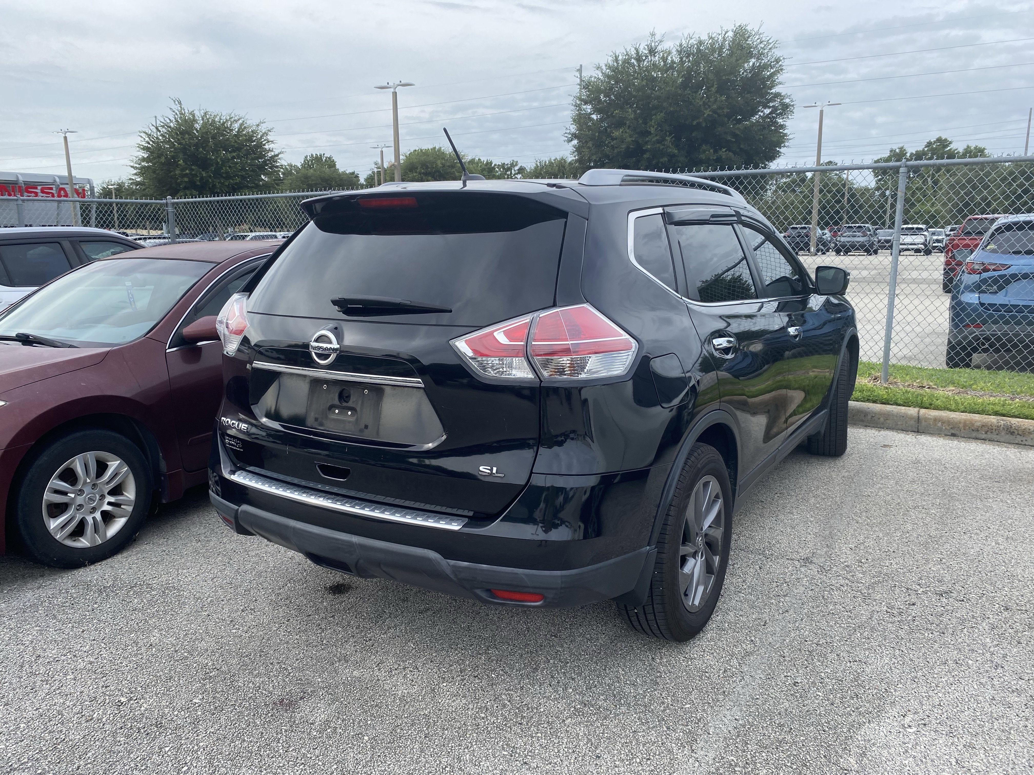 Used 2016 Nissan Rogue SL with VIN 5N1AT2MT1GC864670 for sale in Winter Haven, FL