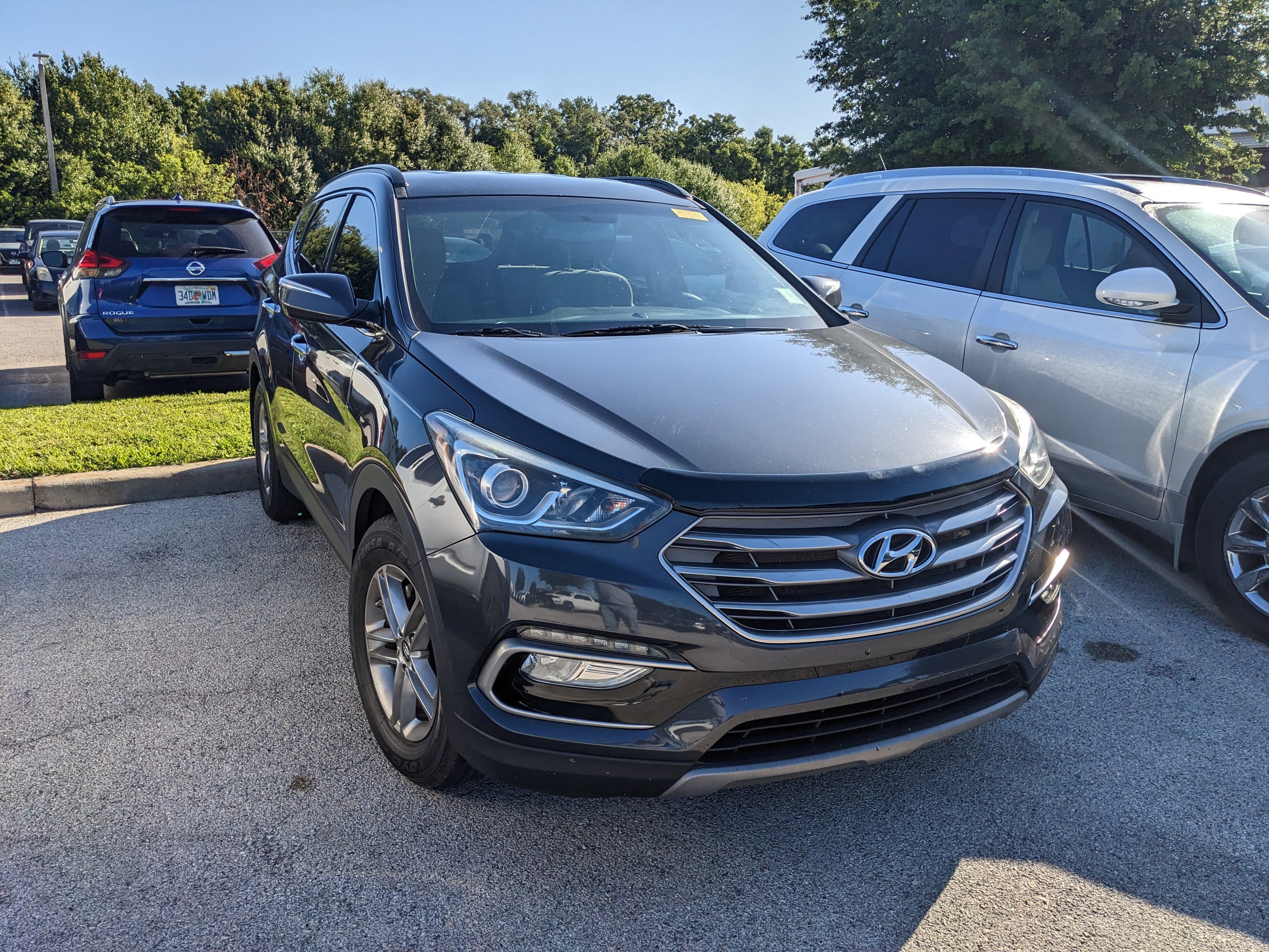Used 2018 Hyundai Santa Fe Sport with VIN 5XYZU3LB3JG525589 for sale in Winter Haven, FL