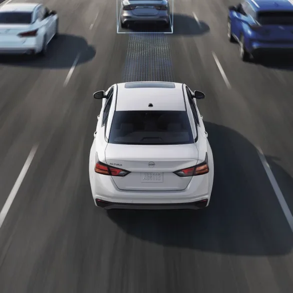 2027 Nissan Altima on freeway surrounded by cars with schematic drawings of ProPILOT Assist capabilities at Hill Nissan in Winter Haven FL